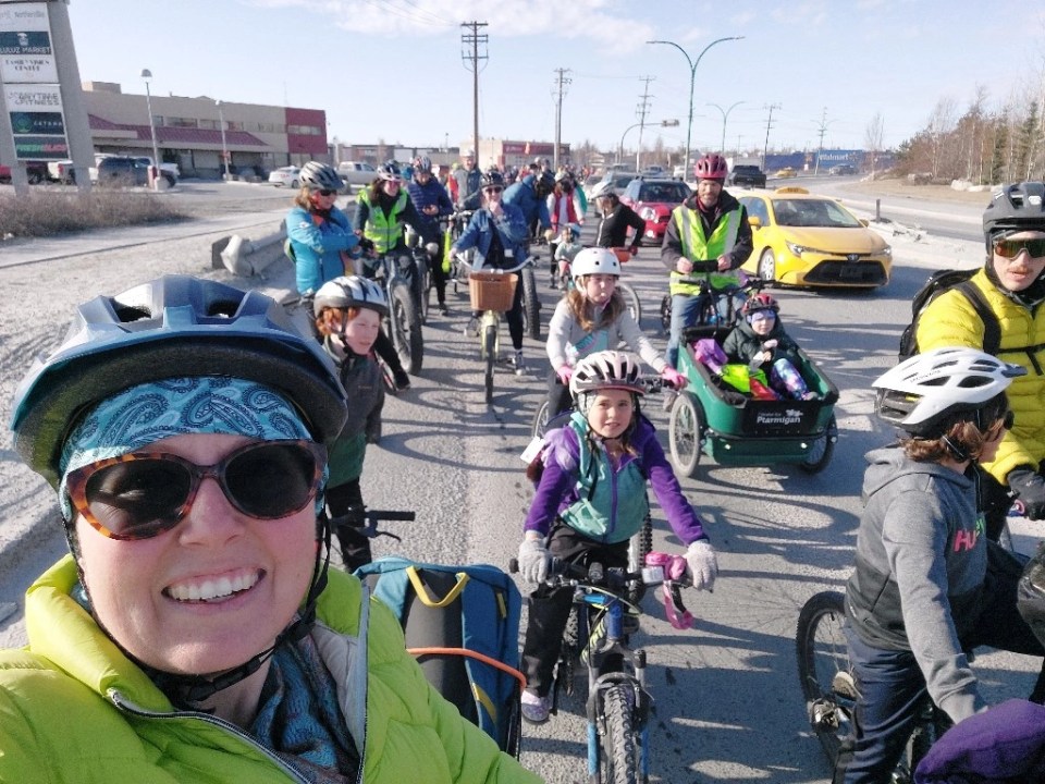 Becca Denley, bottom left, on the mass bike ride. Photo: Submitted