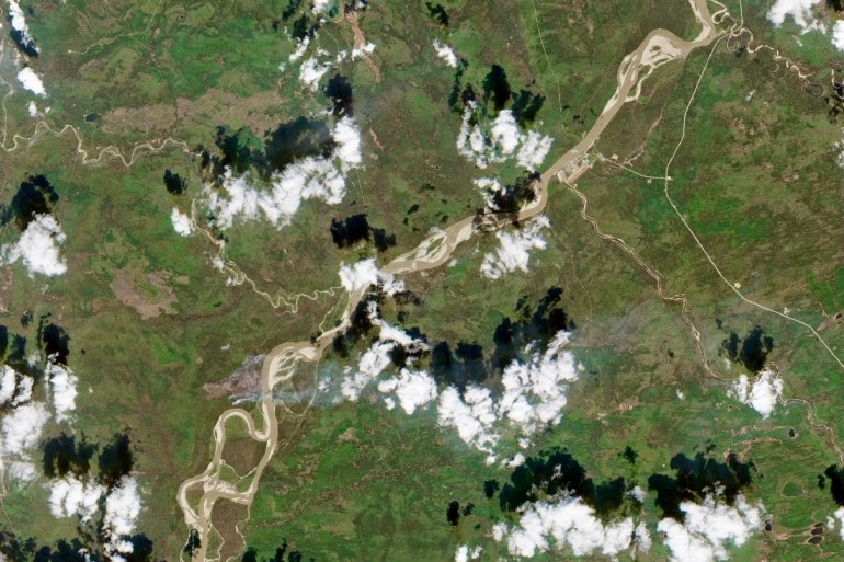 The Fort Liard wildfire is seen in a Copernicus Sentinel-2 satellite image on May 13, 2024. The fire is in the bottom left of the picture with the hamlet in the top right.