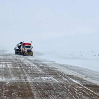 An oversized load makes a trip along the Dempster Highway. Simona Rosenfield/Cabin Radio