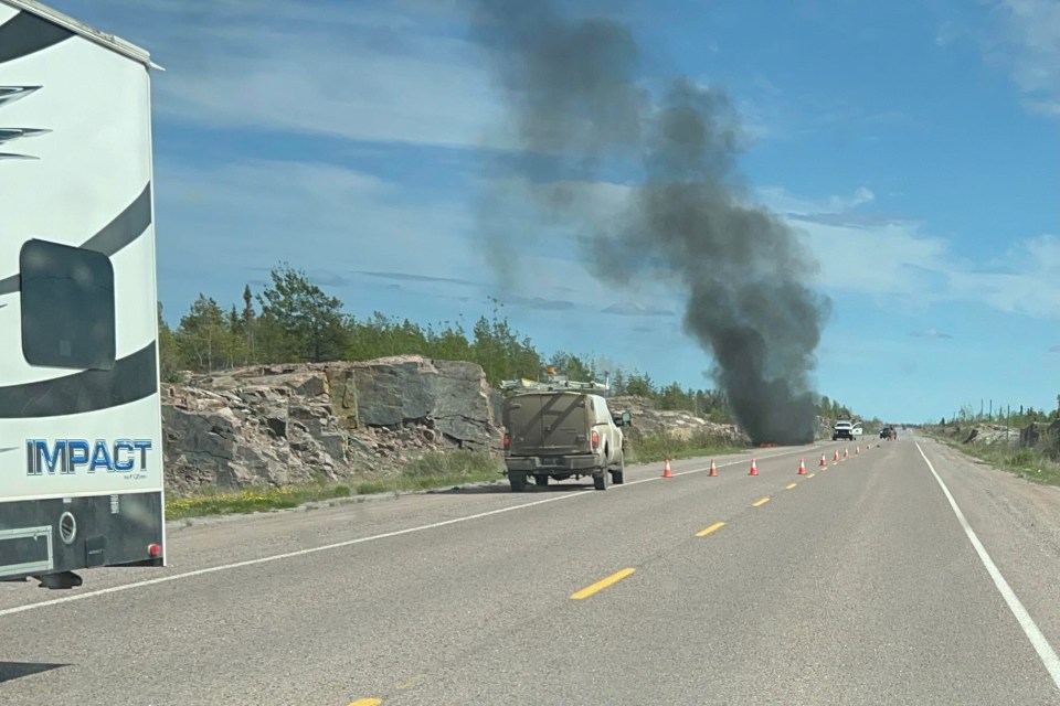A burning vehicle on Highway 3 on June 5, 2024. Photo: Darrell Ohokannoak