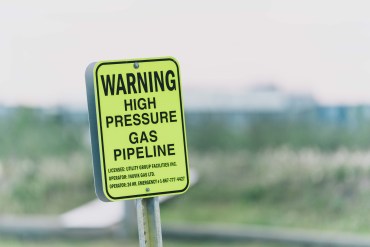 A gas pipeline sign in Inuvik. Sarah Pruys/Cabin Radio