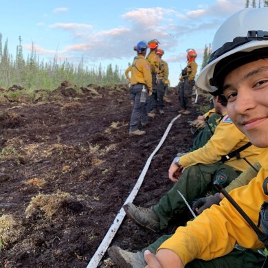 Firefighters are seen in a photo published by NWT Fire in June 2024.