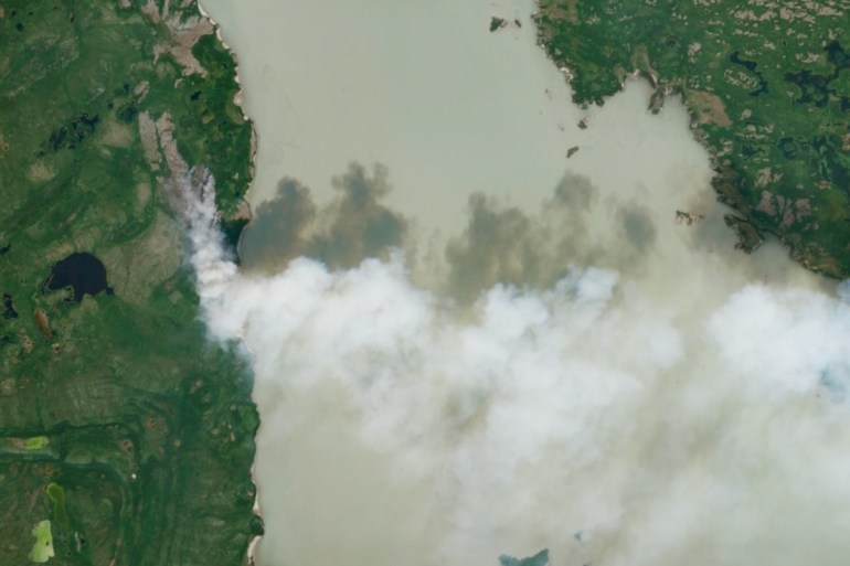 A wildfire on the western shore of Marian Lake is seen in a Copernicus Sentinel-2 satellite image on July 1, 2024.