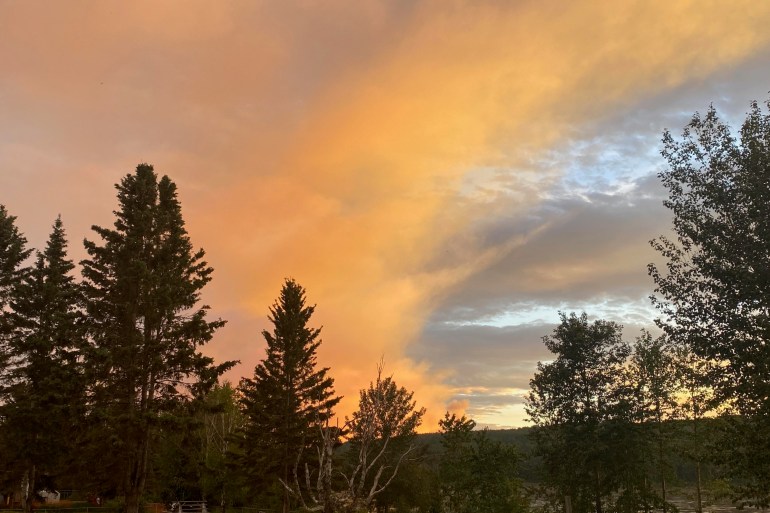 Wildfire smoke is seen from Fort Liard in July 2024. Photo: Miranda Holly