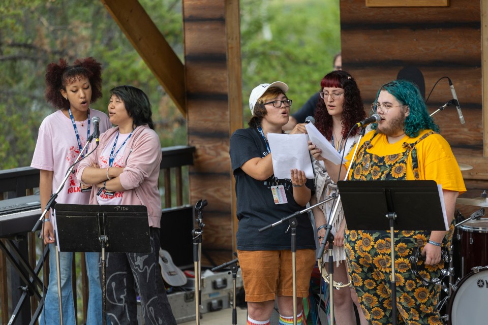 The Northern Mosaic Network's festival-opening set on the Cabin Stage at Folk on the Rocks 2024. Ollie Williams/Cabin Radio
