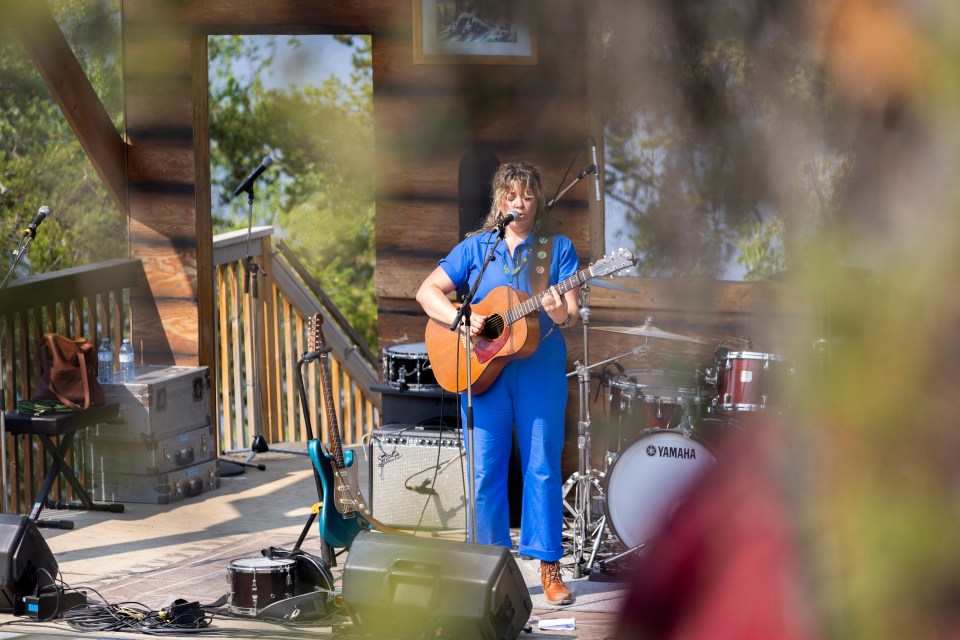 Andrina Turenne plays the Cabin Radio Lakefront Stage on July 21, 2024. Ollie Williams/Cabin Radio