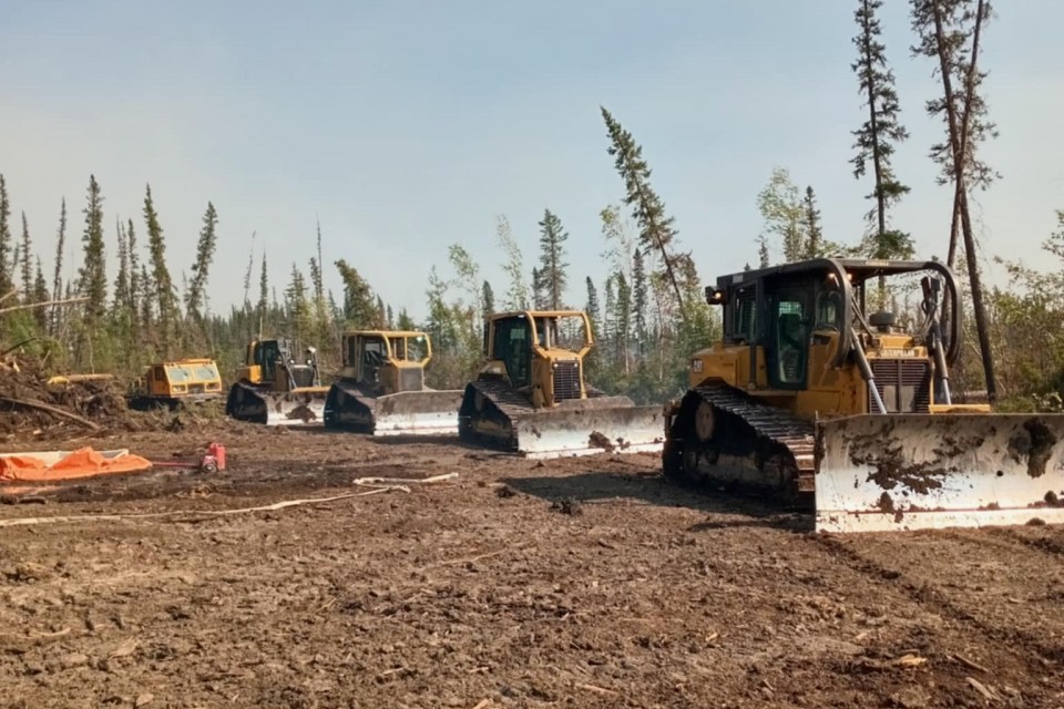 Heavy equipment near wildfires at the NWT-Alberta border. Photo submitted by Dylan Jones