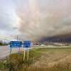 A cloud of smoke rolls in above Enterprise on August 26, 2024. Photo: Stephen Fochuk