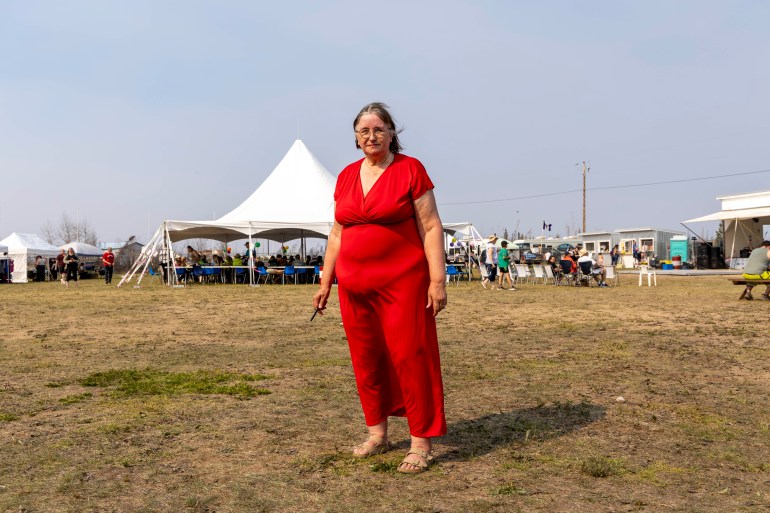 Genevieve Clarke at the Enterprise jamboree in 2024, a year after the community was hit by a wildfire. Ollie Williams/Cabin Radio