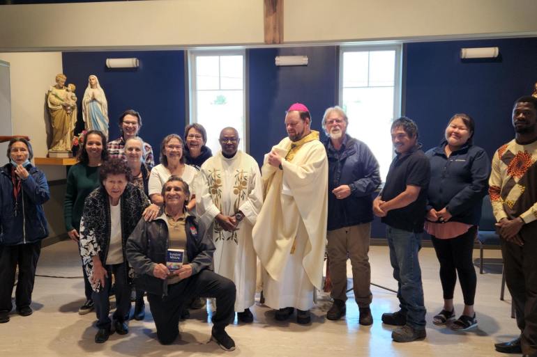 Bishop Jon Hansen visits Fort Simpson to celebrate the 25th anniversary of Father Peter Anochirim joining the priesthood. Photo: Submitted