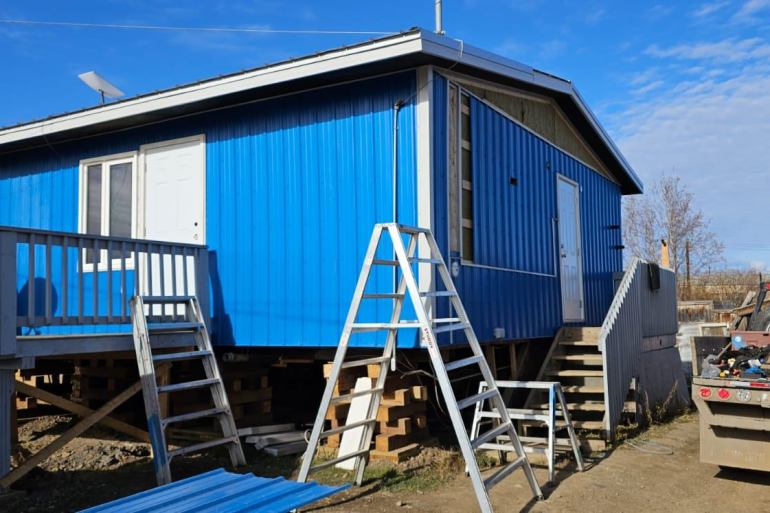 Five Fort McPherson residents are retrofitting their homes through a pilot project launched by Dinjii Zhuh Solutions. Photo: Trina Nerysoo
