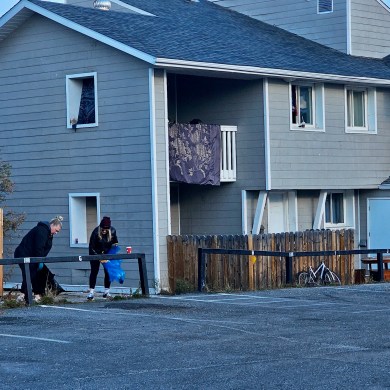 Kam Lake MLA Caitlin Cleveland, left, and constituency assistant Leslie Straker take part in a clean-up of Bigelow Crescent on October 5, 2024. Ollie Williams/Cabin Radio