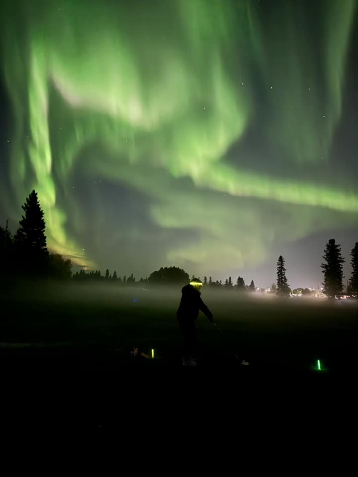 Glow golf under the northern lights in Fort Simpson. Photo: Allyson Skinner