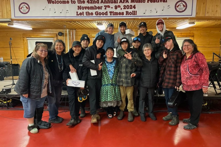 The Athabascan Fiddlers Festival brought together youth musicians from the Mackenzie Delta, including Kiedyn Nerysoo, Gavin Francis, Brendan Vittrekwa, Tucker Gordon, Zody Kay and Ethan Koe, pictured here with festival organizers. Photo: Submitted