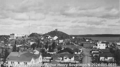 Old Town from McAvoy Rock in Yellowknife in the 1940s. Pilot's Lane and John Anderson-Thomson's home are in the foreground. Bishop Arthur Henry Sovereign/NWT Archives