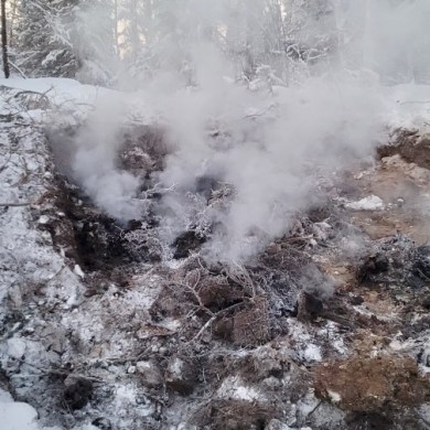 A GNWT-issued photograph of a fire that began outside Norman Wells in December 2024.