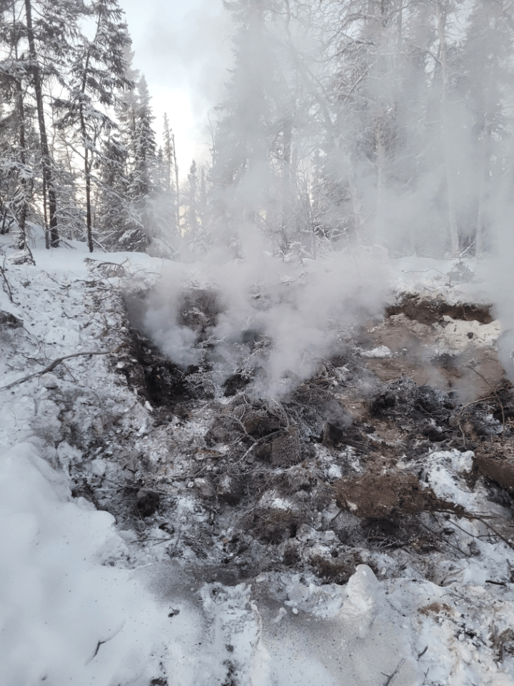 A GNWT-issued photograph of a fire that began outside Norman Wells in December 2024.