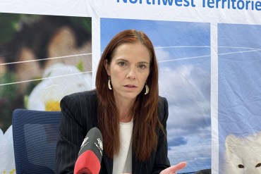Finance minister Caroline Wawzonek speaks to reporters ahead of the 2025-26 budget release. Emily Blake/Cabin Radio