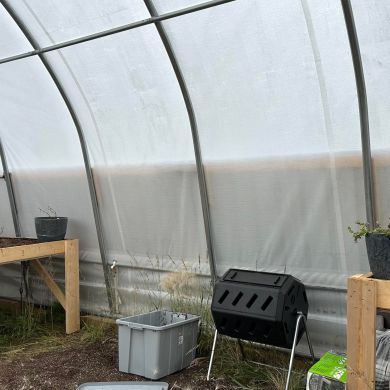 A composter placed inside Tuktoyaktuk's community greenhouse. Photo: Vlad Galbin
