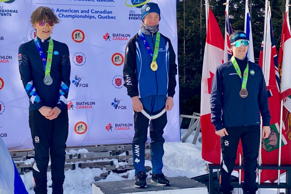 Kason Coombs, centre, on the podium at biathlon nationals in Valcartier, Quebec in March 2025. Photo: Submitted