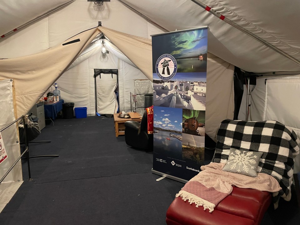 A tent at Arctic Duchess set up with NWT Medical Association branding for a physician wellness event. Photo: Submitted