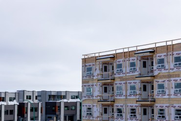 An apartment complex under construction in Yellowknife in March 2025. Ollie Williams/Cabin Radio