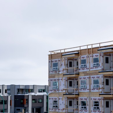 An apartment complex under construction in Yellowknife in March 2025. Ollie Williams/Cabin Radio