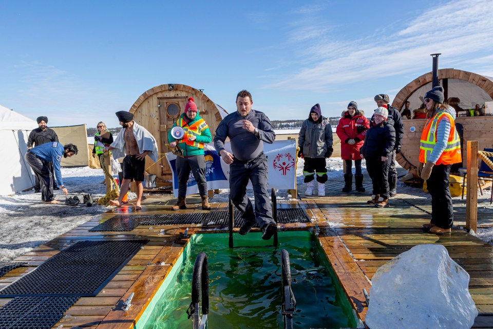 Members of Risk Control, a security company, took part in the plunge. Photo: Val Pond Photography