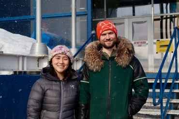 Theresa, left, and Patrick outside Inuvik's advance polling station on April 18, 2025. Claire McFarlane/Cabin Radio