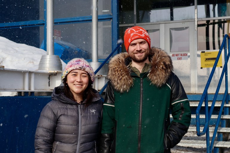 Theresa, left, and Patrick outside Inuvik's advance polling station on April 18, 2025. Claire McFarlane/Cabin Radio