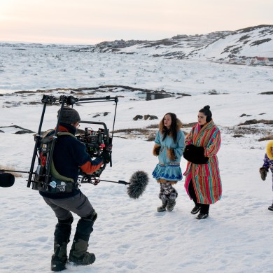From left: Maika Harper as Neevee, Anna Lambe as Siaja, and Hope Akeeagok filming episode 101 of North of North. Jasper Savage/APTN/CBC/Netflix