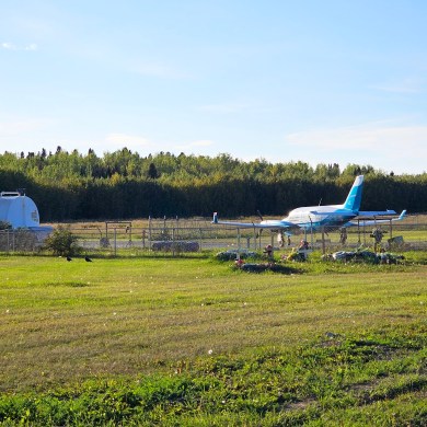 A Simpson Air plane beside Fort Simpson's island airstrip in September 2023. Ollie Williams/Cabin Radio