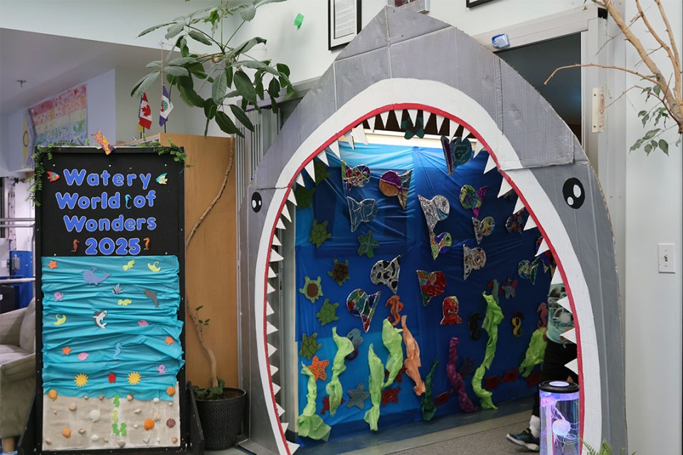 Entrance to the venue decorated with a giant shark mouth surrounding the doorway.