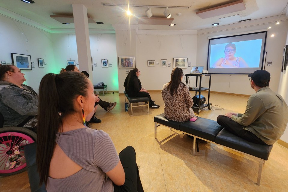 A video message from Laura Kalinek plays at the 2025 Frank Gruben Pride Festival. Karli Zschogner for Cabin Radio