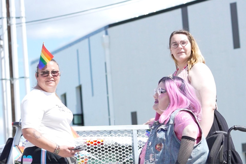 Fort Smith's mayor, Dana Fergusson (left), with Yellowknife's Jake Flanagan, centre, and Hannah Pederson. Karli Zschogner for Cabin Radio