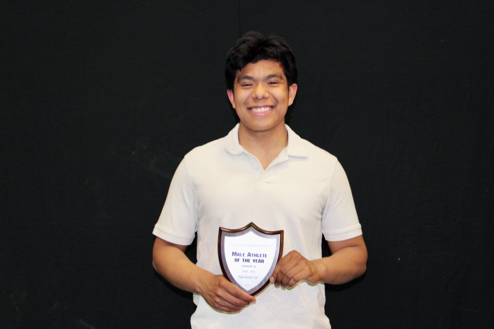 Mario Hernandez-Mellin with his Male Athlete of the Year plaque. Sara Verheul/Cabin Radio