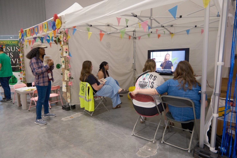 Festival patrons watching an educational video about the Philippines. Kate Shanrey Mendoza/Philippine Cultural Association of Yellowknife