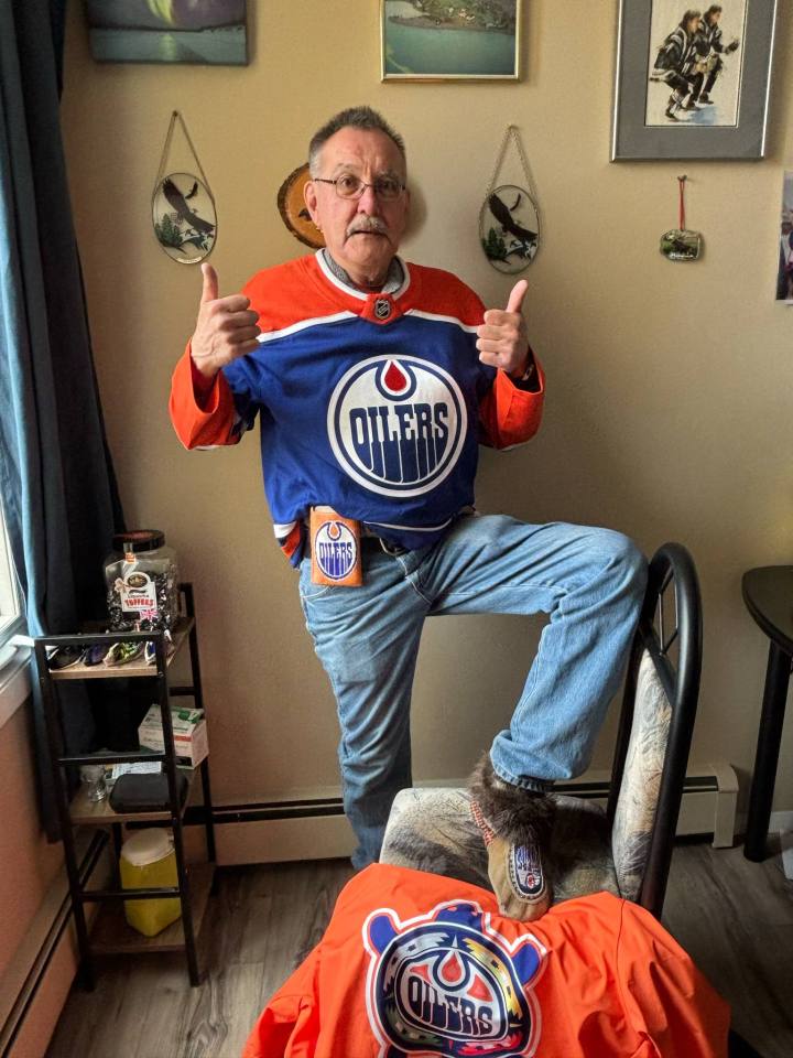 Donald Arey submitted a photo showing off beaded Oilers moccasins and a phone case.