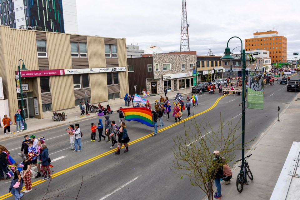 The parade makes its way down 50 Avenue. Ollie Williams/Cabin Radio