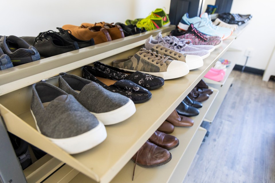 Shoes lined up for sale. Ollie Williams/Cabin Radio