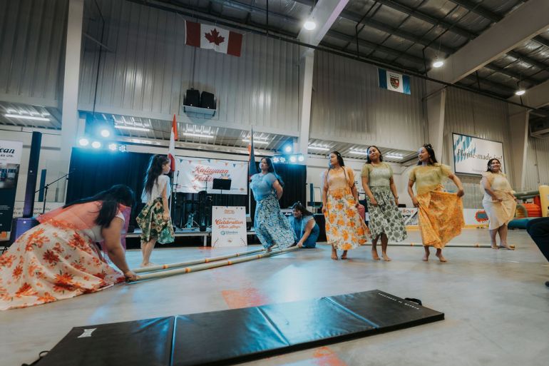 Dancers perform a Tinikling dance. Billy Refugia/Philippine Cultural Association of Yellowknife