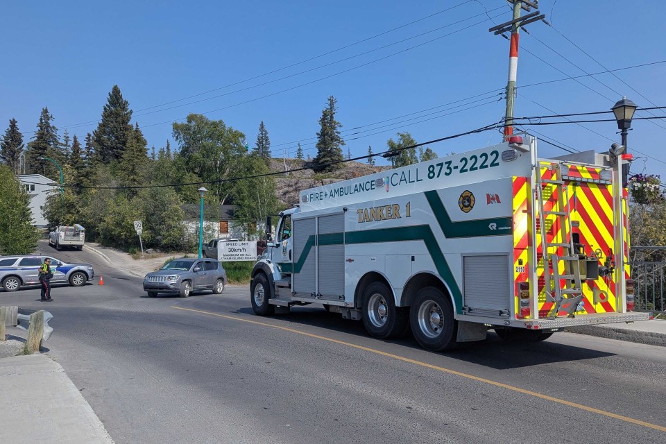 A fire truck on the causeway to Latham Island on June 27, 2025. Sarah Pruys/Cabin Radio