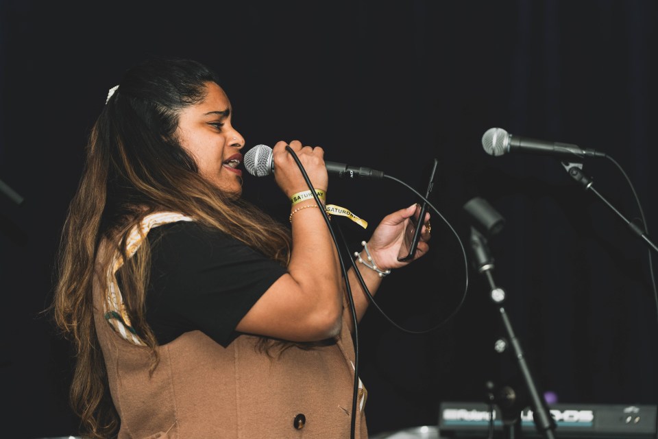 Hrhythom sings a song karaoke-style. Sarah Pruys/Cabin Radio