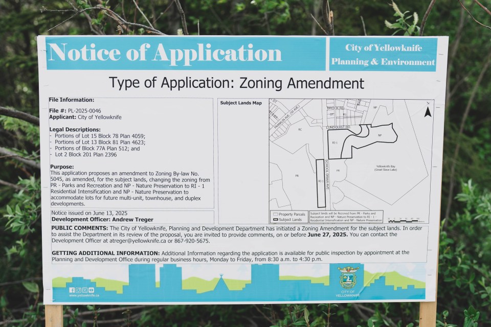 A photo of a sign setting out the proposed zoning amendment. Sarah Pruys/Cabin Radio