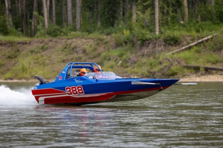 Spencer and Russell King speed over the water outside Grande Prairie, Alberta. Photo submitted by Spencer King