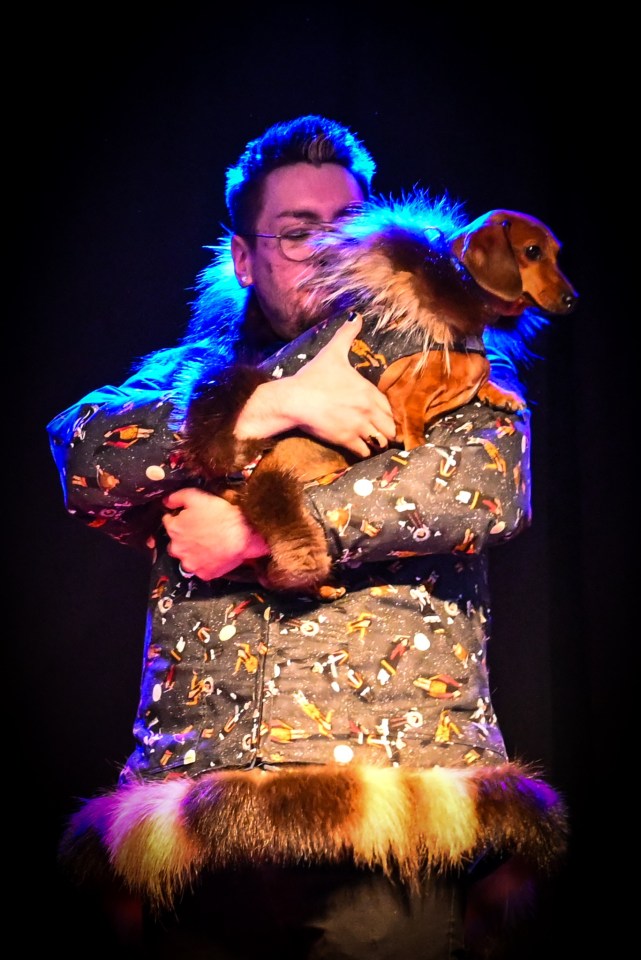 Dustin Smith showcases a dog parki – including dog. Tony Devlin/Arctic Development Expo