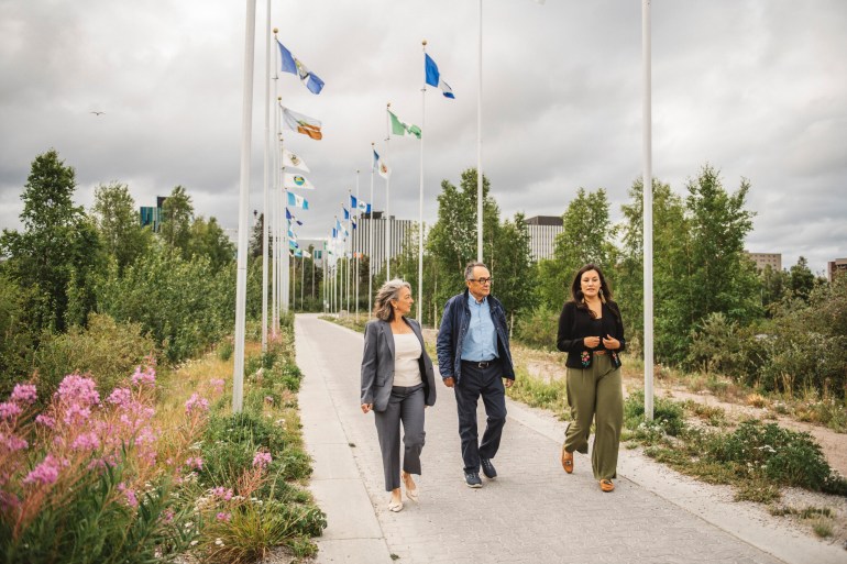 From left: Federal environment minister Julie Dabrusin, trust chair Danny Yakeleya and ILI deputy director Dahti Tsetso in Yellowknife on July 21, 2025. Photo: Angela Gzowski