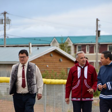 From left: IRC Chair Duane Ningaqsiq Smith, Mark Carney and Inuit Tapiriit Kanatami President Natan Obed in Inuvik on July 24, 2025. Karli Zschogner for Cabin Radio
