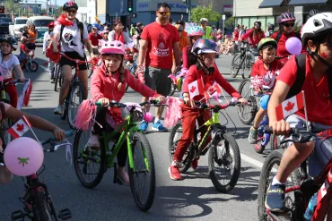 Participants in Yellowknife's 2025 Canada Day parade. Serra Hamilton/Cabin Radio