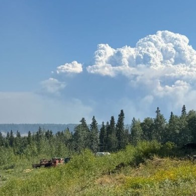 The smoke plume from fire FS014 is seen from Fort Simpson in late July 2025. Photo: Celine Antoine